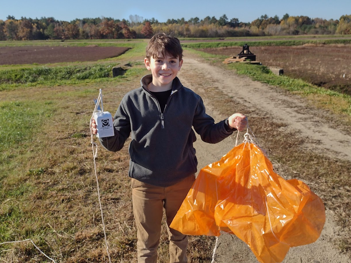 Radiosonde recovery in cranberry bog
